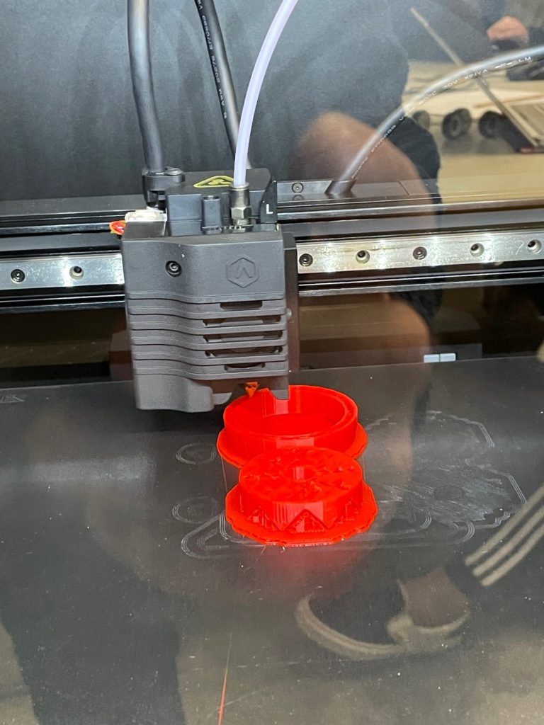 An object being created with a 3D printer.